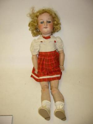 Appraisal: An Armand Marseille bisque head girl doll with blue glass