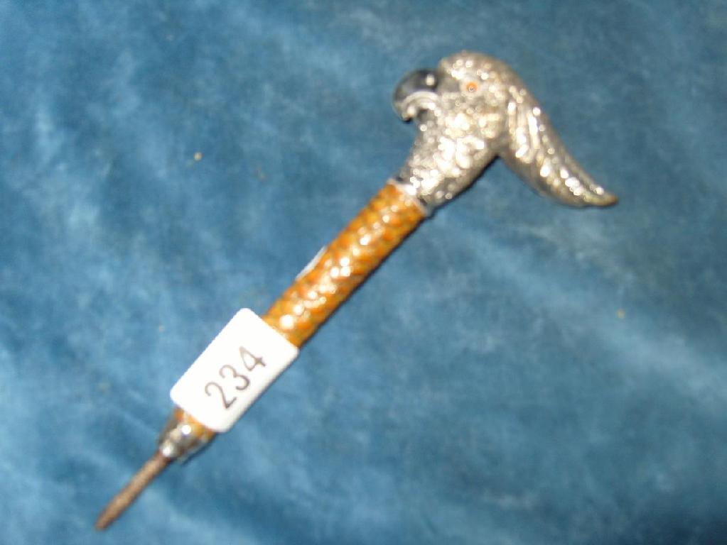 Appraisal: A continental silver plated umbrella handle in the form of