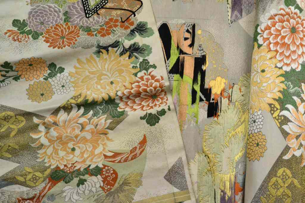 Appraisal: Japanese Obi Silk MaterialDepicting lotus blossoms and carts ''L X