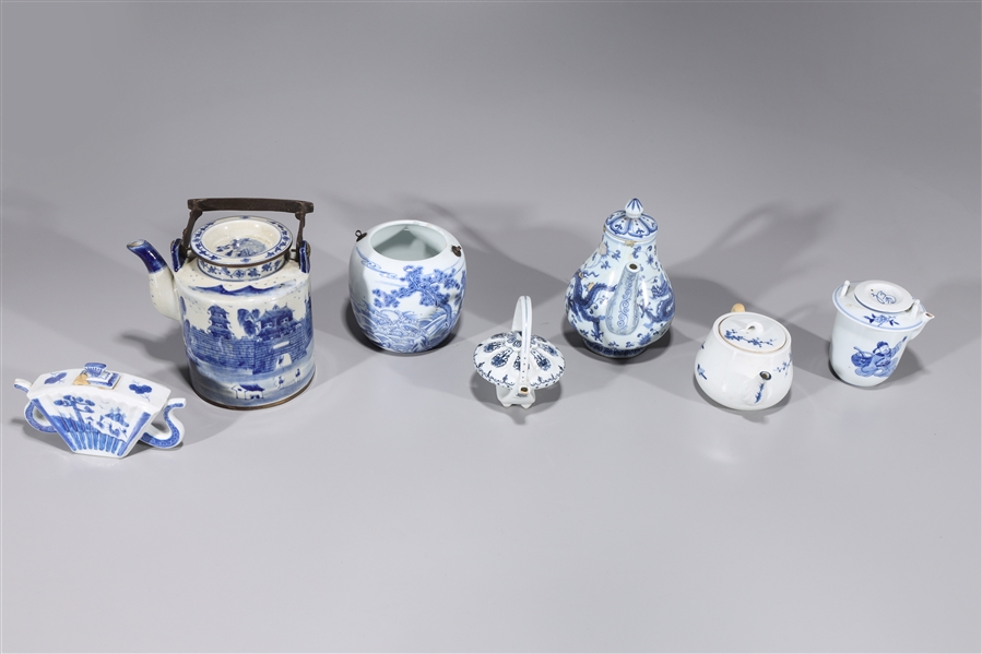 Appraisal: Group of seven Chinese blue and white porcelain teapots including