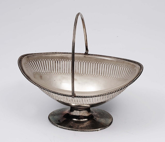 Appraisal: A silver bon bon dishof lozenge shaped form with loop