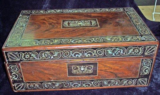 Appraisal: An early Victorian rosewood work box inlaid mother-of-pearl with brass