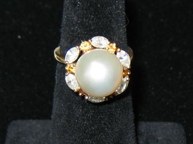 Appraisal: PEARL AND DIAMOND RING MM South Sea pearl set with