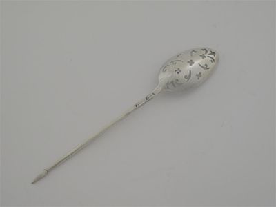 Appraisal: A late George II mote spoon with a double drop