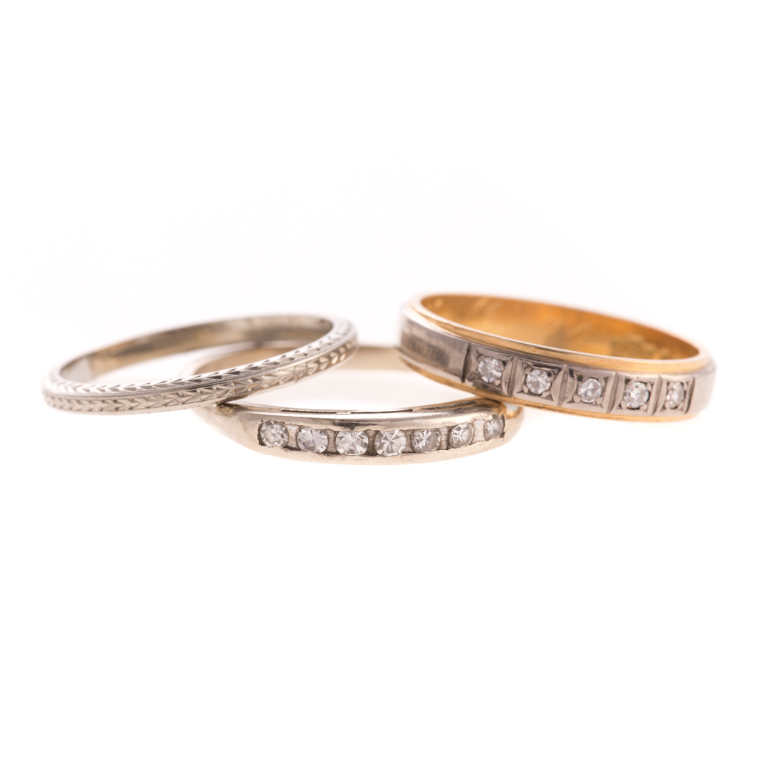 Appraisal: A Trio of Lady's Wedding Bands K white gold engraved