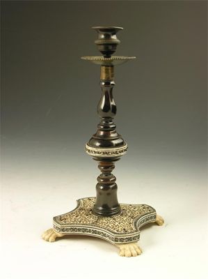 Appraisal: A th century Anglo-Indian turned horn and ivory candlestick raised