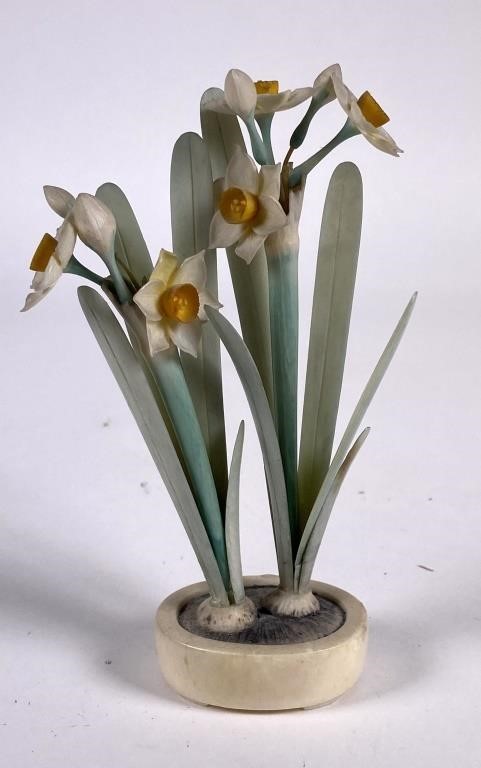 Appraisal: Finely carved Japanese Ivory flowering narcissus plant Has some damage