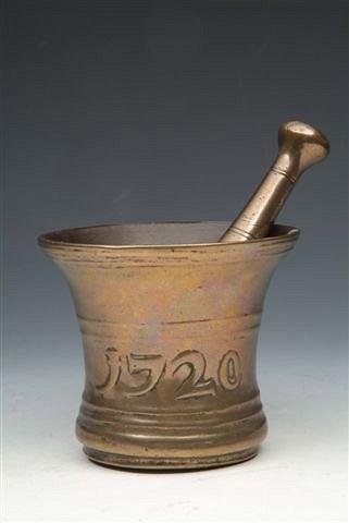 Appraisal: A BRONZE PESTLE AND MORTAR marked 'I R I '