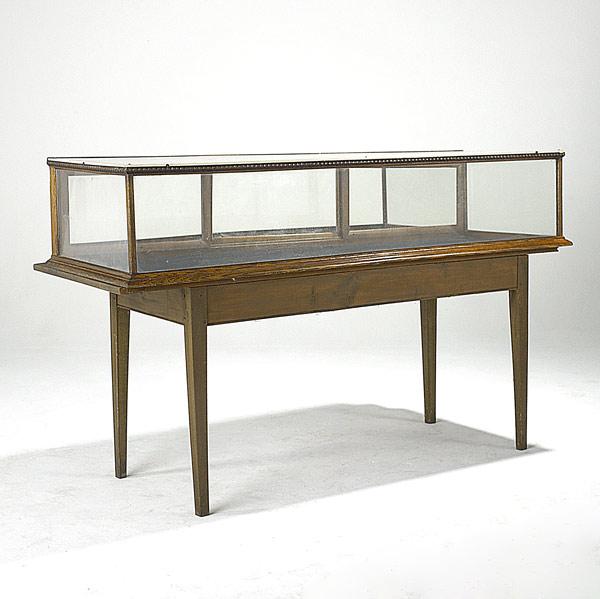 Appraisal: COUNTERTOP DISPLAY CASE Oak mounted on farm table base early