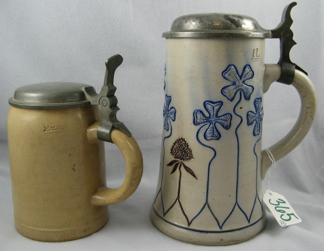 Appraisal: TWO GERMAN STONEWARE BEER STEINS One is a salt glaze