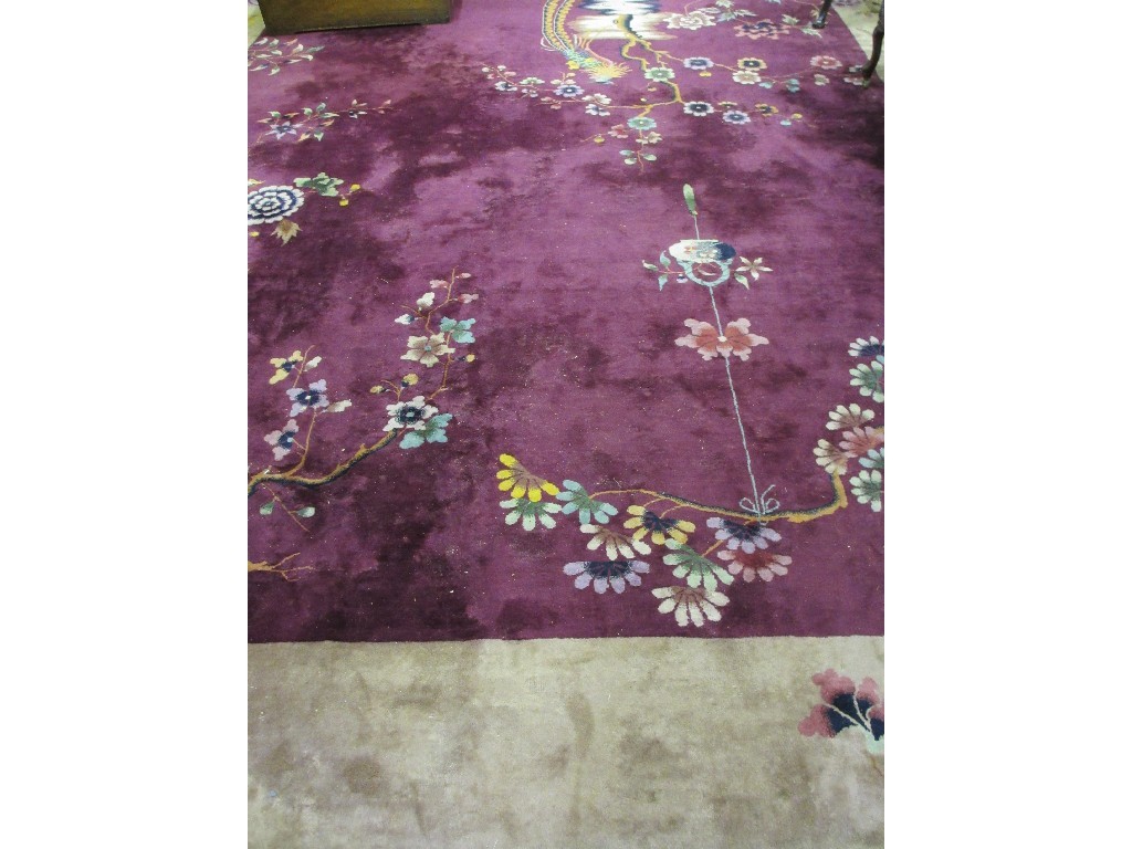 Appraisal: Large Chinese carpet decorated with birds of paradise