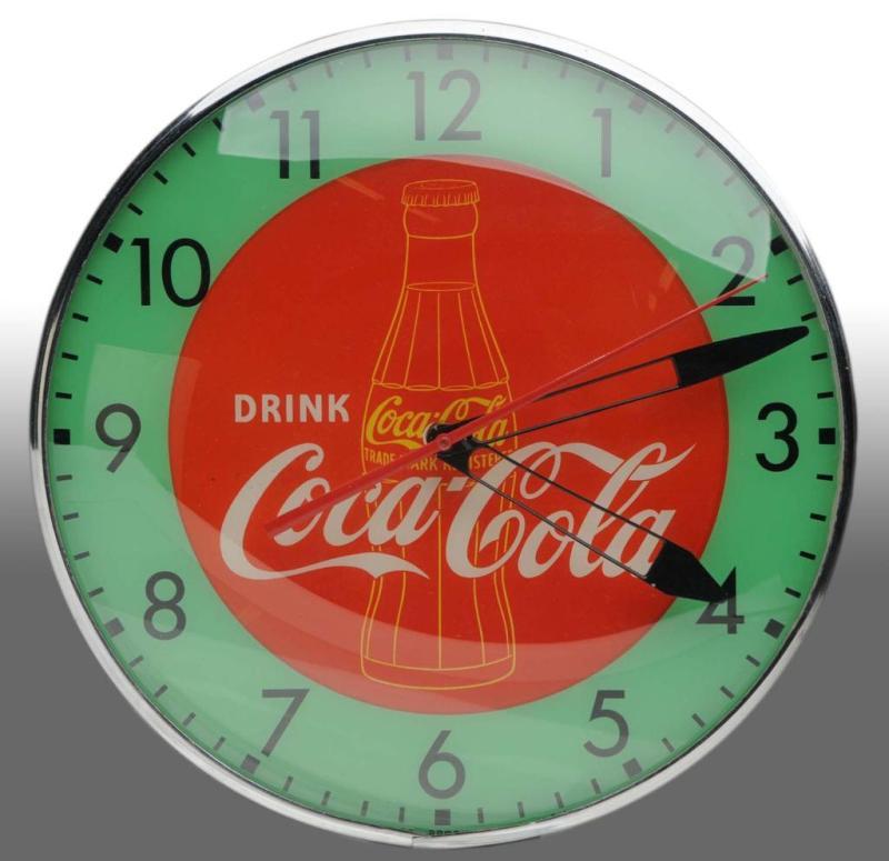 Appraisal: Coca-Cola Electric Light-Up Pam Clock Description s Only light wear