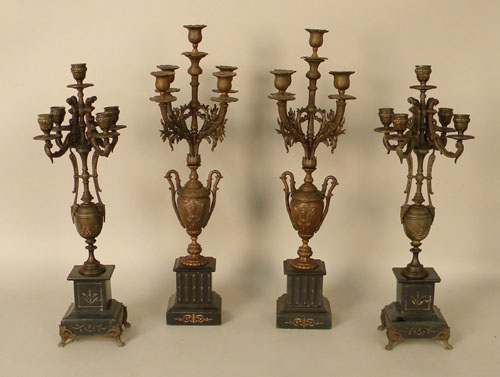 Appraisal: Two pair of bronzed candelabra h and h