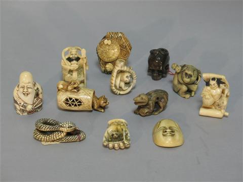 Appraisal: COLLECTION OF TWELVE JAPANESE NETSUKE Including Ebisu and his fan