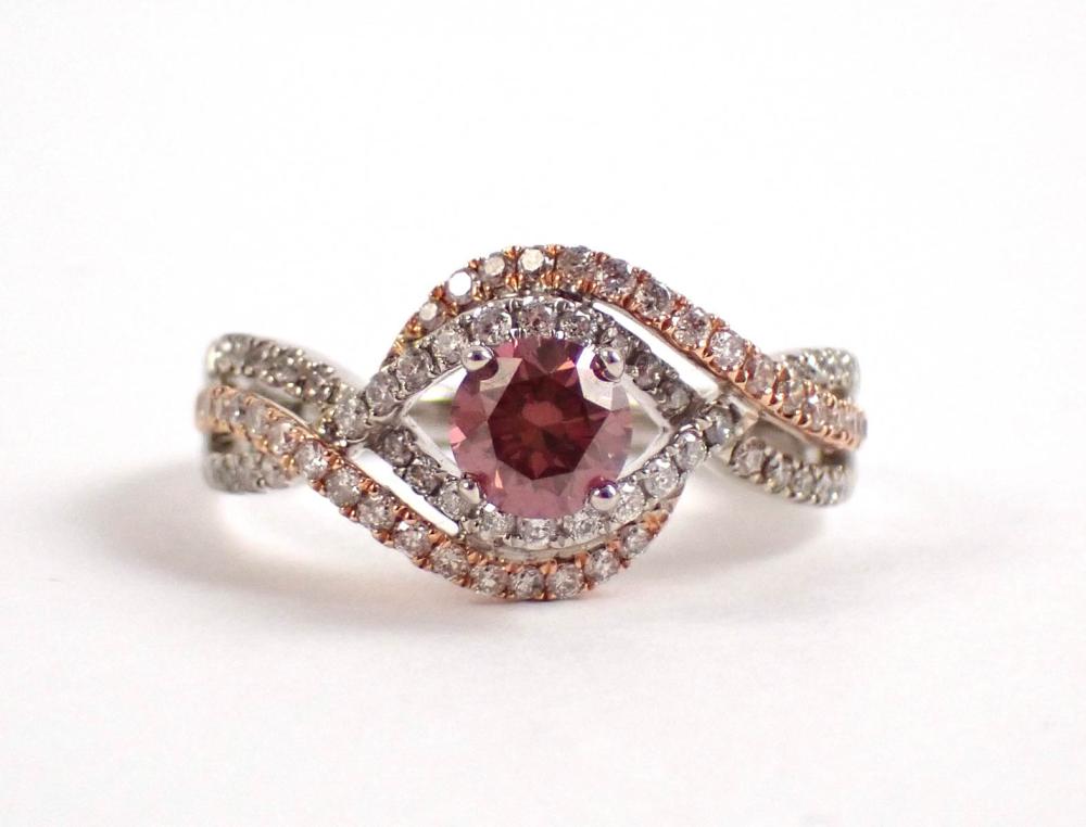 Appraisal: PINK DIAMOND WHITE DIAMONDS AND FOURTEEN KARAT WHITE YELLOW GOLD