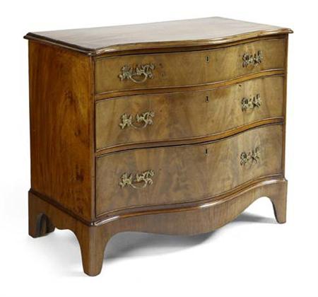 Appraisal: A George III mahogany serpentine chest the top with moulded