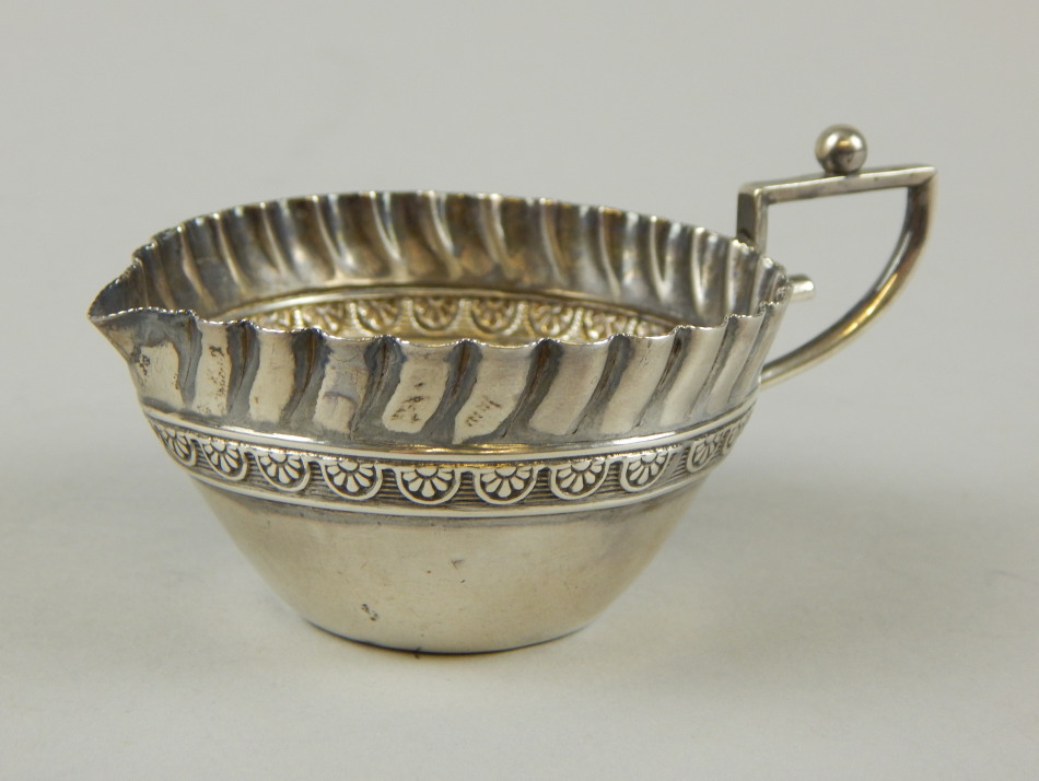 Appraisal: An early thC silver cream jug by CT Burrows Sons