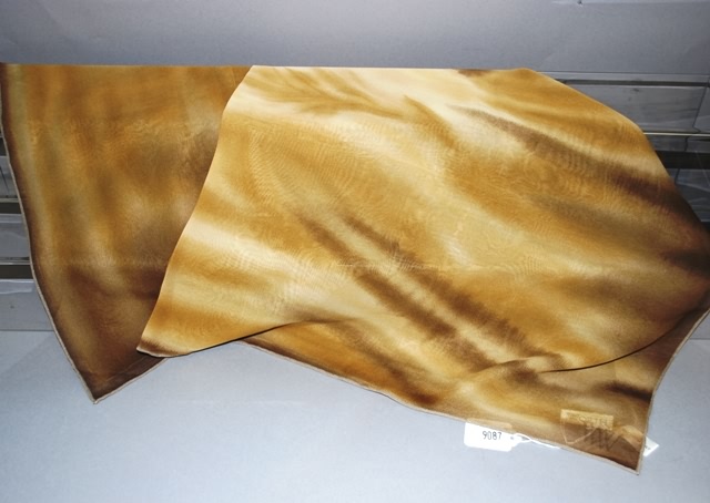 Appraisal: Worth brown gold cream print silk scarf Approx size x