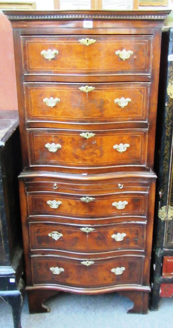 Appraisal: A th century walnut serpentine chest on chest of six