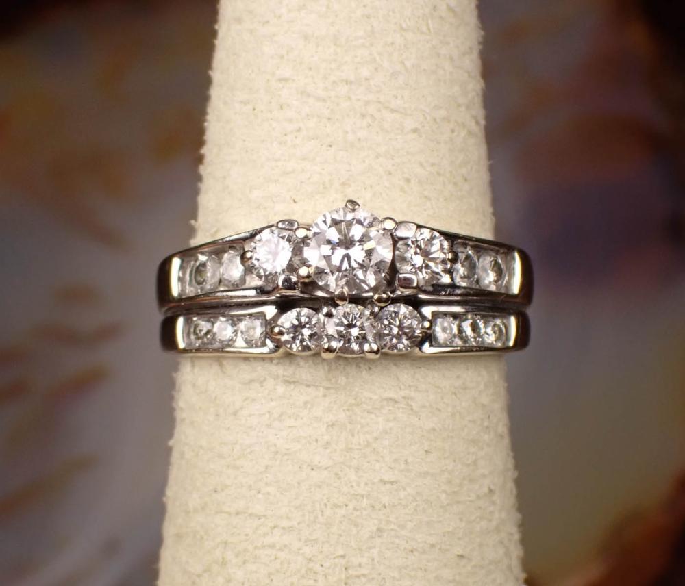 Appraisal: LOVE STORY DIAMOND AND FOURTEEN KARAT GOLD WEDDING SET including