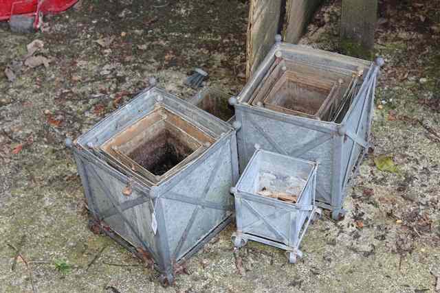 Appraisal: A GROUP OF VARIOUS GALVANIZED SQUARE PLANTERS each with ball