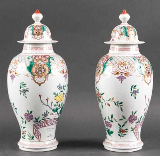 Appraisal: Pair of Dutch polychrome delft covered jars in the Oriental