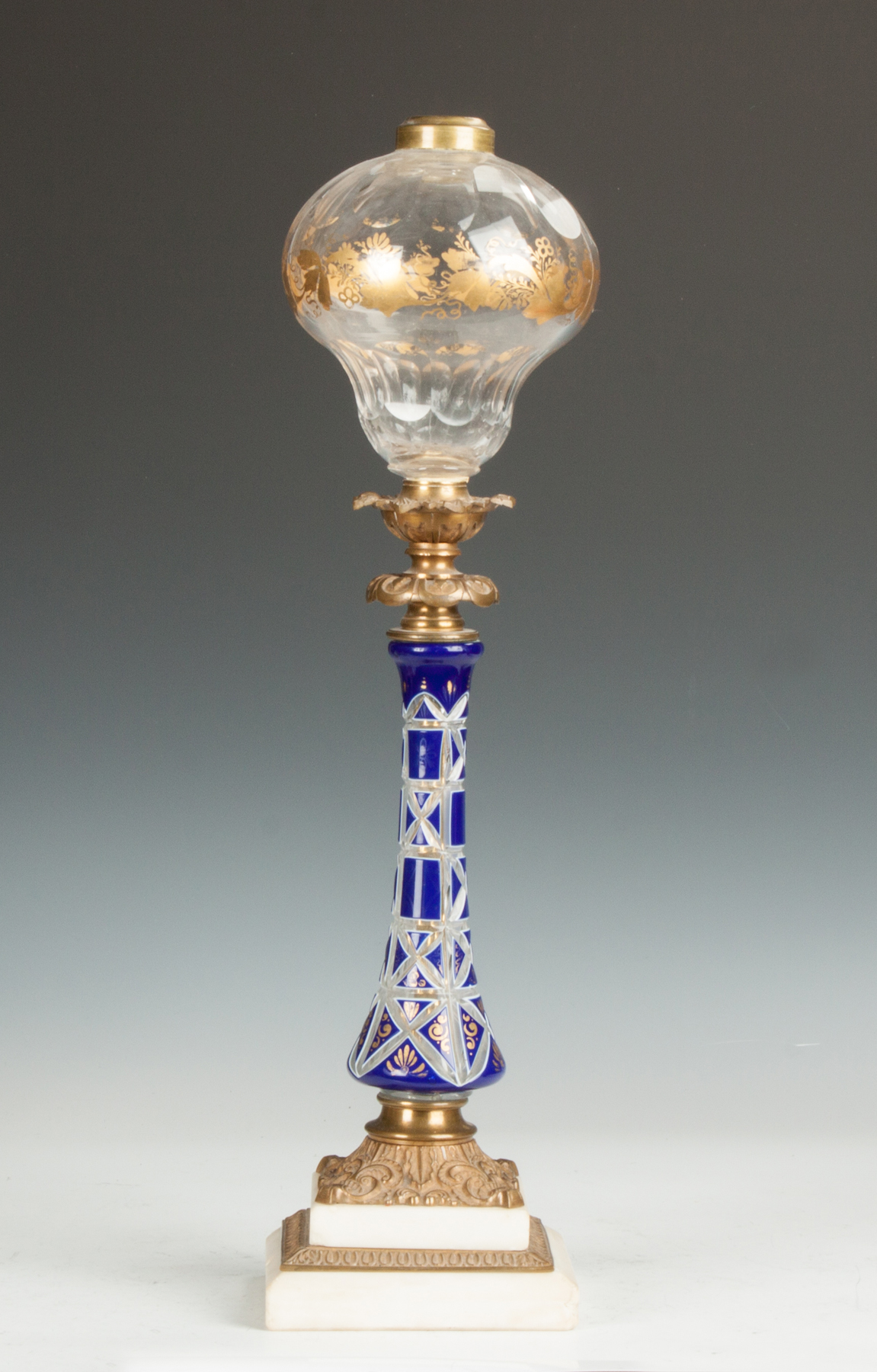 Appraisal: Blue White Overlay Fluid Lamp Early th cent Gilded decoration