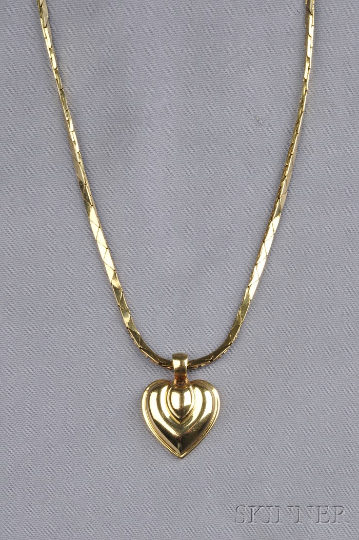 Appraisal: kt Gold Heart Pendant Cartier France designed as a partially