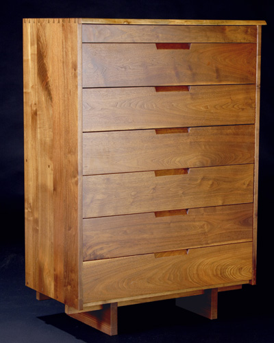 Appraisal: GEORGE NAKASHIMA Walnut highboy with free-edge top over seven drawers