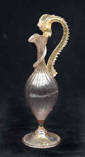 Appraisal: A VENETIAN GLASS EWER possibly Salviati and Company oviform with