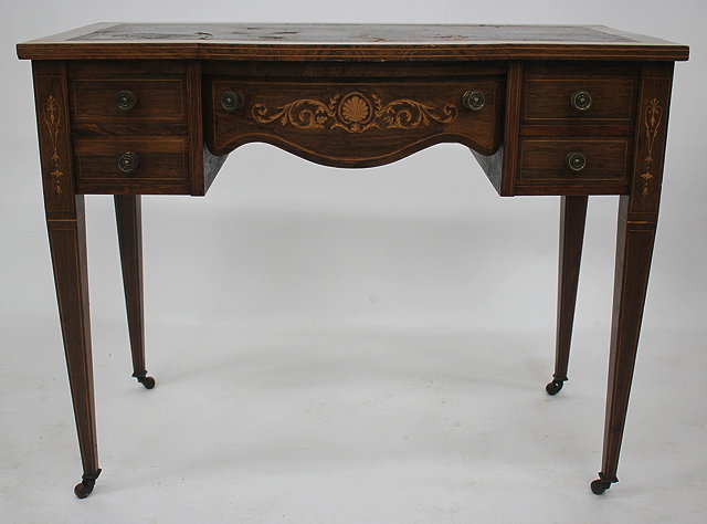 Appraisal: A VICTORIAN LADIES BOW FRONT ROSEWOOD WRITING DESK with leather