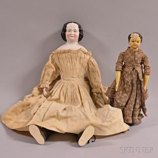 Appraisal: Two Dolls an early painted girl doll and a China