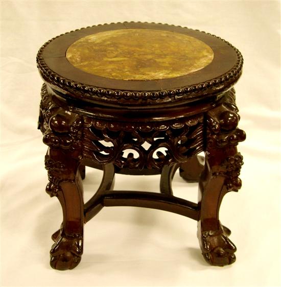 Appraisal: Chinese wood stand chocolate marble inset into round top over