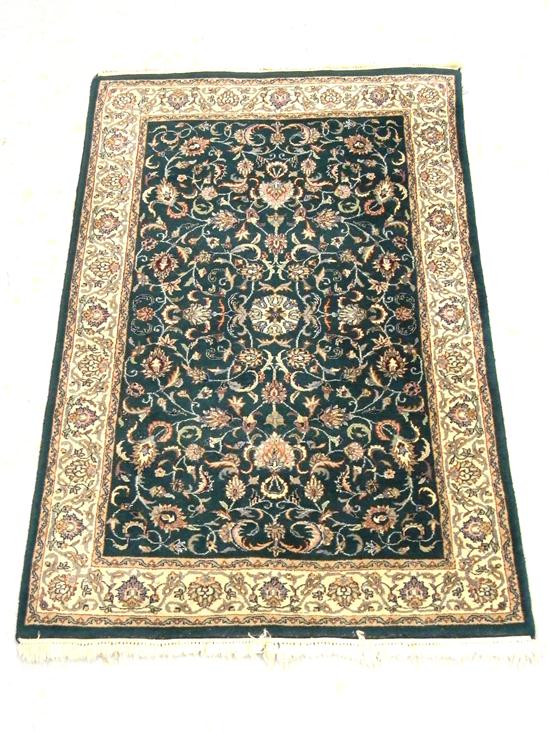 Appraisal: Modern Indo-Persian rug ' x ' emerald green central field