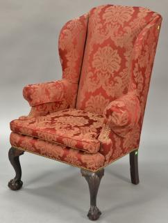 Appraisal: Margolis mahogany Chippendale style upholstered wing chair set on shell