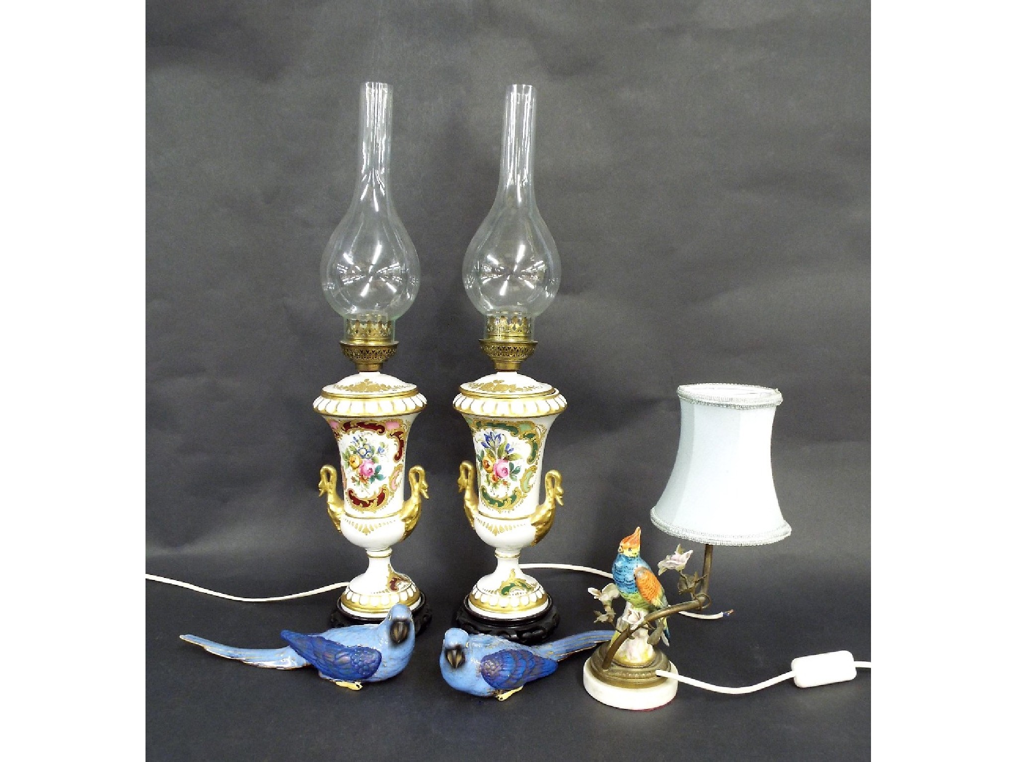 Appraisal: Pair of porcelain baluster table lamps with twin gilt swan