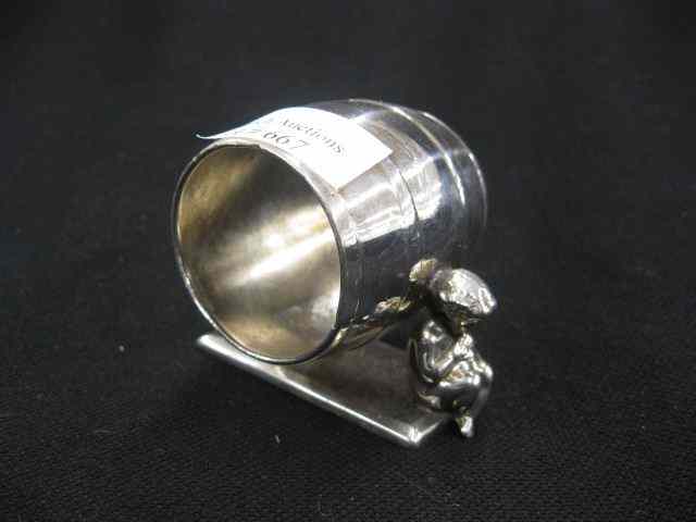 Appraisal: Victorian Figural Silverplate Napkin Ring naked children on each side