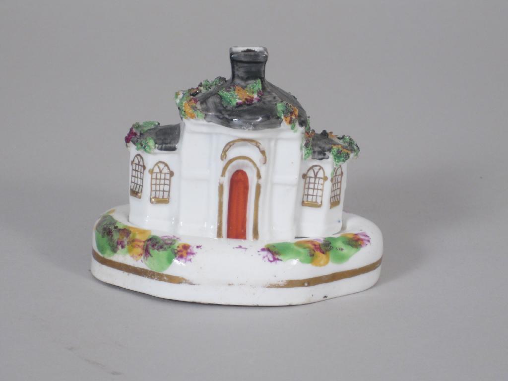 Appraisal: A th Century Staffordshire Pastille Burner with floral encrustations and