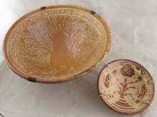 Appraisal: A display mounted deep ceramic bowl with decoration in the