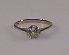 Appraisal: A solitaire diamond ring a round brilliant cut stone of