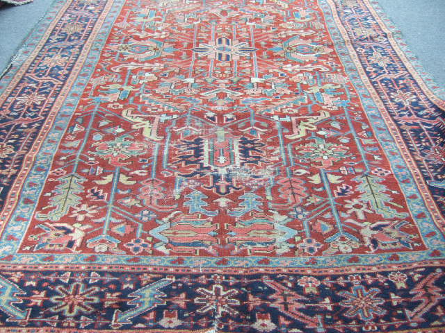 Appraisal: An Heriz carpet Persian the madder field with an allover