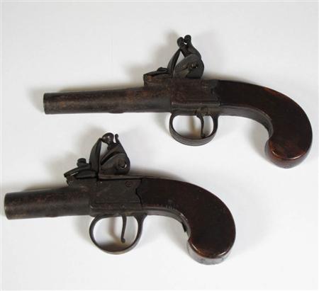 Appraisal: Two boxlock flintlock pocket pistols one marked R WARD cm