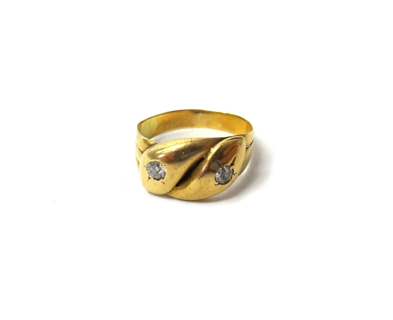 Appraisal: A gold and diamond set ring designed as two entwined