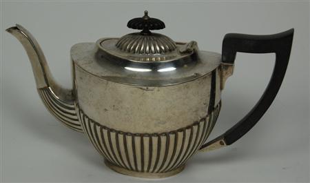 Appraisal: A teapot by Viners Sheffield with fluted lower section and