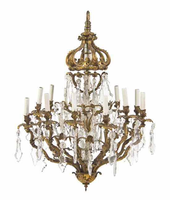 Appraisal: A Continental Gilt Bronze Twelve-Light Chandelier of cage form hung