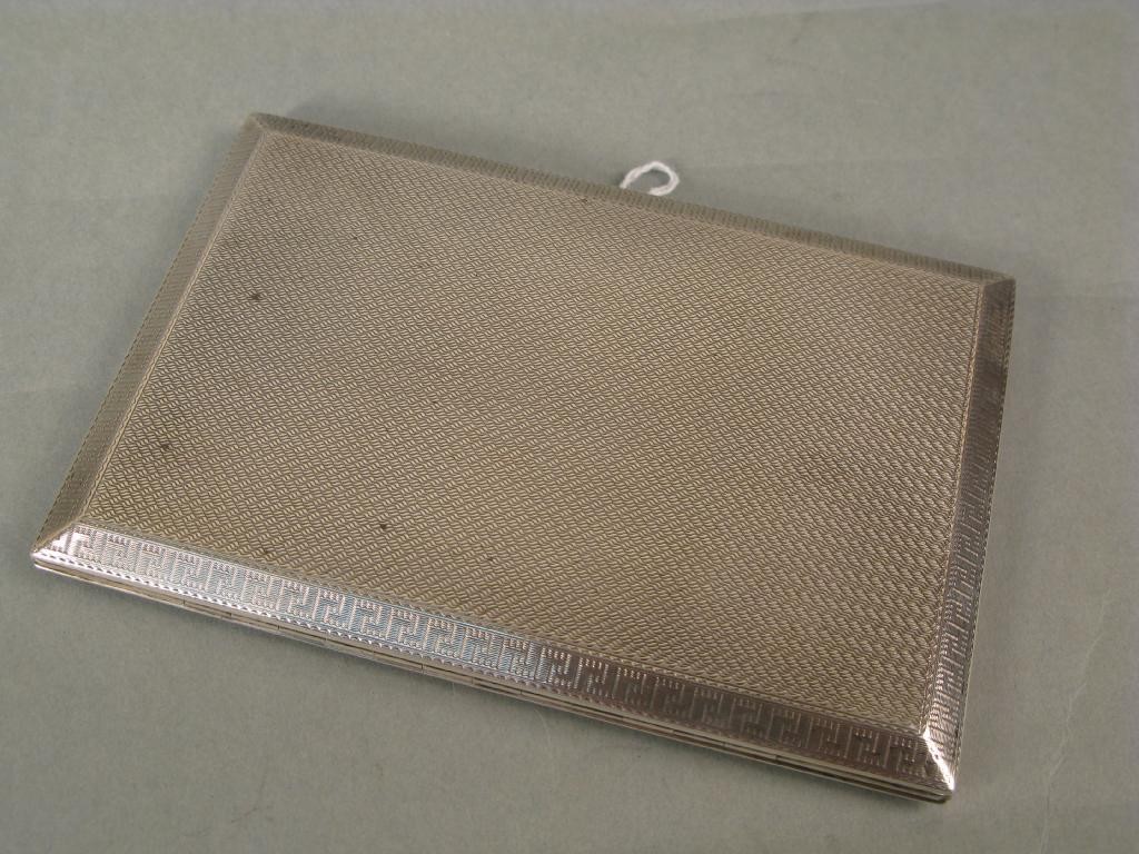 Appraisal: An engine turned silver cigarette case Birm approx ozs