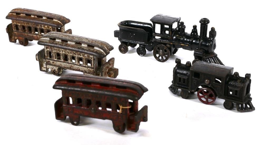 Appraisal: ANTIQUE CAST IRON TRAIN SETFive piece cast iron trains including