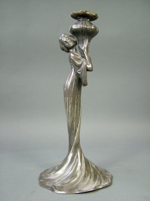 Appraisal: A WMF pewter figural candelabra base early th century modelled