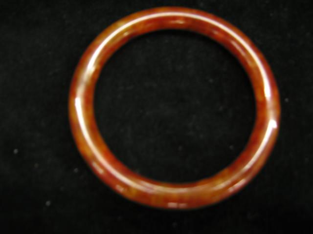 Appraisal: Jade Bangle Bracelet mottled red-brown