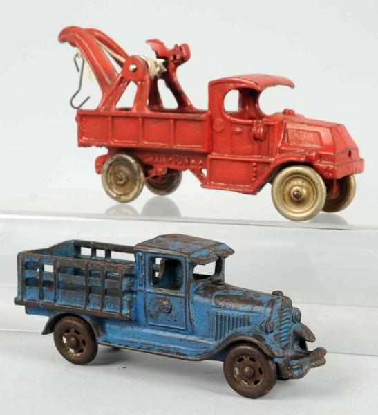 Appraisal: Lot of Cast Iron Truck Toys American Includes one Champion